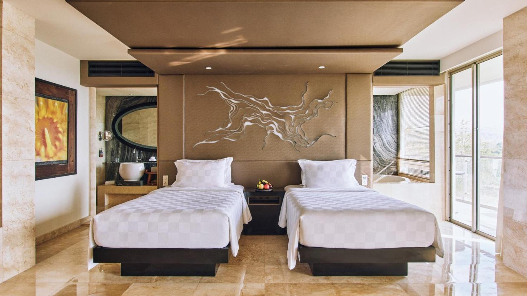 Hotel Rimba By Ayana Bali Jimbaran Exterior foto A bedroom at the hotel