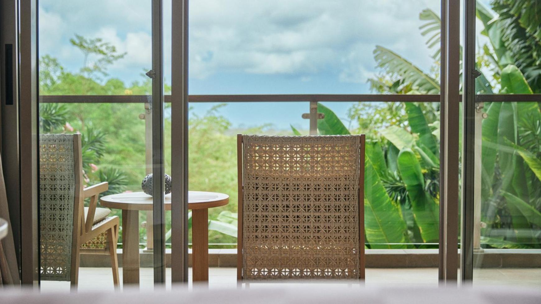 Hotel Rimba By Ayana Bali Jimbaran Exterior foto A view of the lush green surroundings from the balcony of a typical apartment